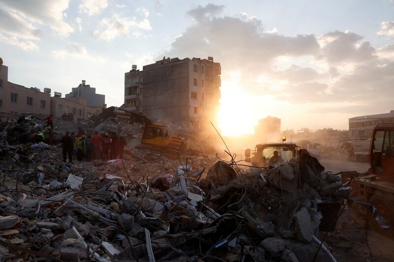 Members of a rescue team work on the site of a collapsed building, as the search for survivors continues, in Iskenderun, Turkey, on February 11. Reuters