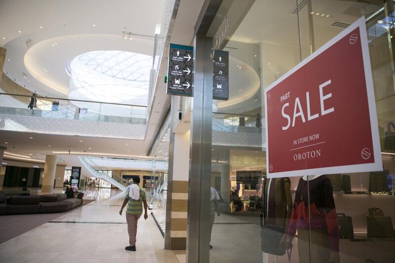 A toilet sign points to a restroom inside the Yas Mall. Some customers are unhappy with the facilities. Silvia Razgova / The National