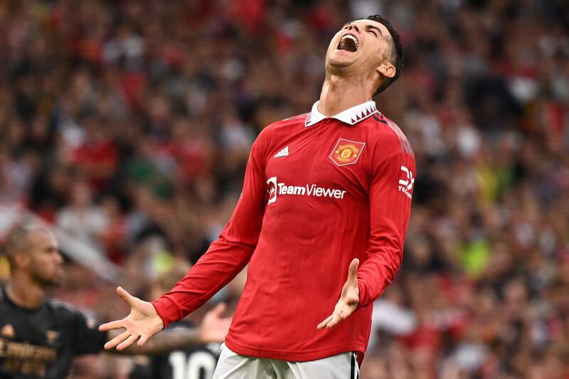 United substitute Cristiano Ronaldo reacts after failing to reach a pass. AFP