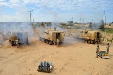 Egyptian soldiers open fire during a major assault against militants in the Sinai Peninsula. Egyptian Military 