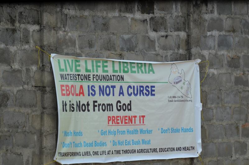 A banner is on the wall of the new Ebola Treatment Centre built by the United States army personnel in Tubmanburg, the provincial capital of Bomi County in western Liberia, on November 10, 2014. AFP