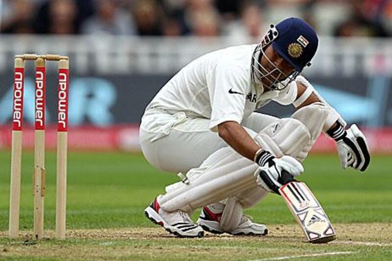 Sachin Tendulkar takes evasive action to an England bouncer during his innings at Edgbaston yesterday.