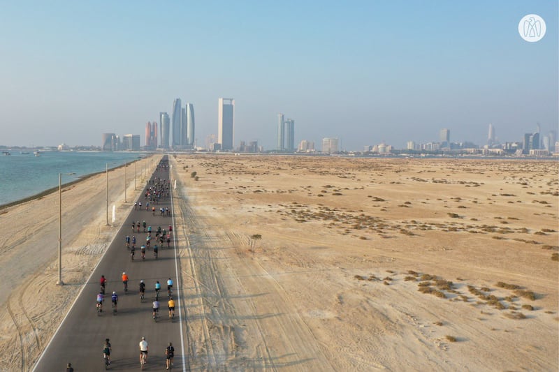 Cyclists on the road to Abu Dhabi. Abu Dhabi Media