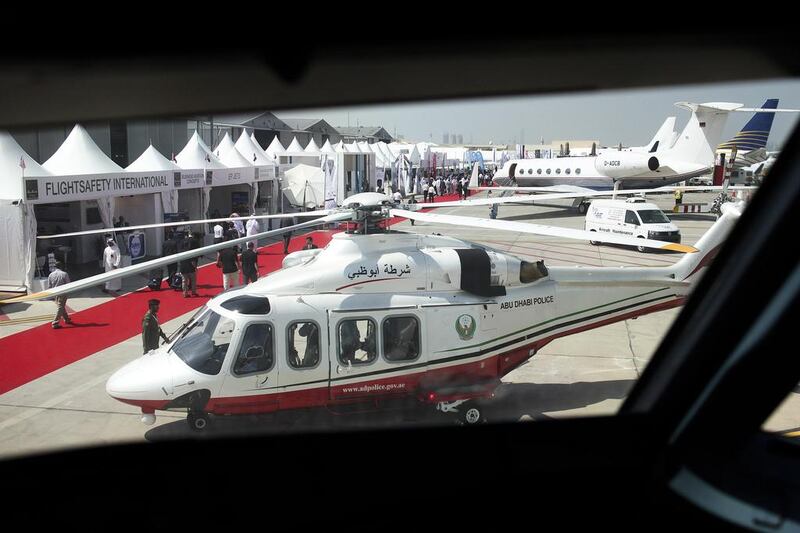 An Abu Dhabi Police helicopter as seen through a cockpit of a plane at the Abu Dhabi Air Expo. Lee Hoagland / The National