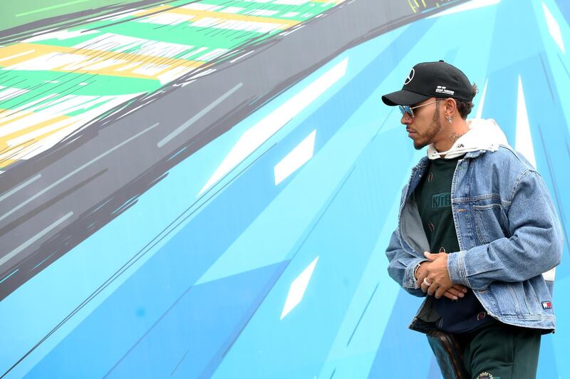 SAO PAULO, BRAZIL - NOVEMBER 08:  Lewis Hamilton of Great Britain and Mercedes GP walks in the Paddock during previews ahead of the Formula One Grand Prix of Brazil at Autodromo Jose Carlos Pace on November 8, 2018 in Sao Paulo, Brazil.  (Photo by Charles Coates/Getty Images)