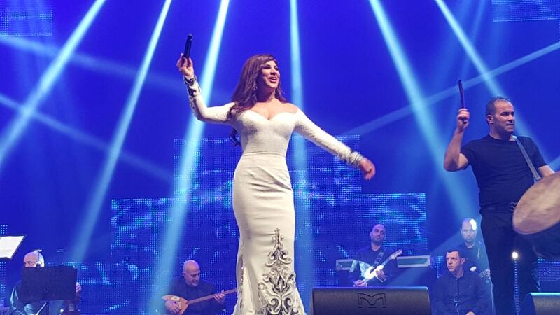 Najwa Karam performs at du Forum, Yas Island, on New Year’s Eve. Saeed Saeed / The National