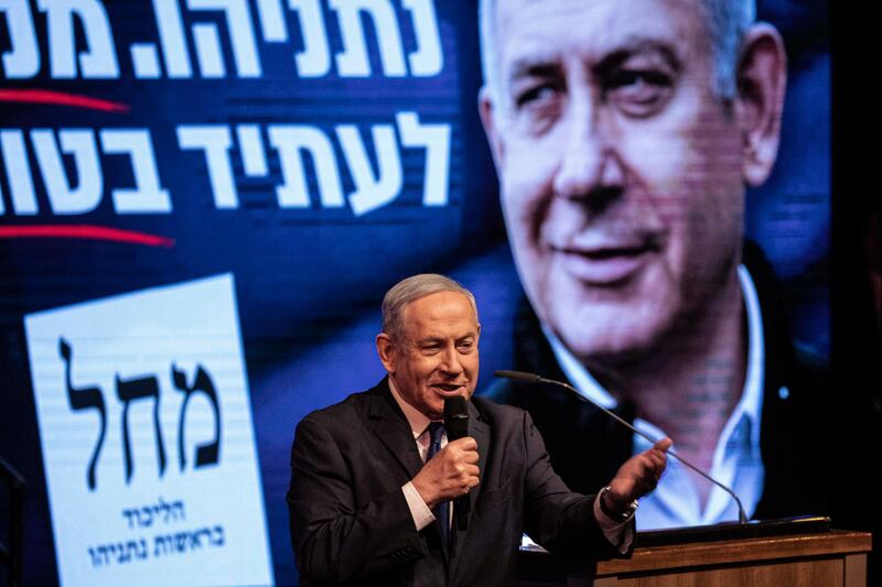 Israeli Prime Minister Benjamin Netanyahu addresses his Likud party supporters during an election campaign rally in Ramat Gan, Israel, Saturday, Feb. 29, 2020. (AP Photo/Tsafrir Abayov)