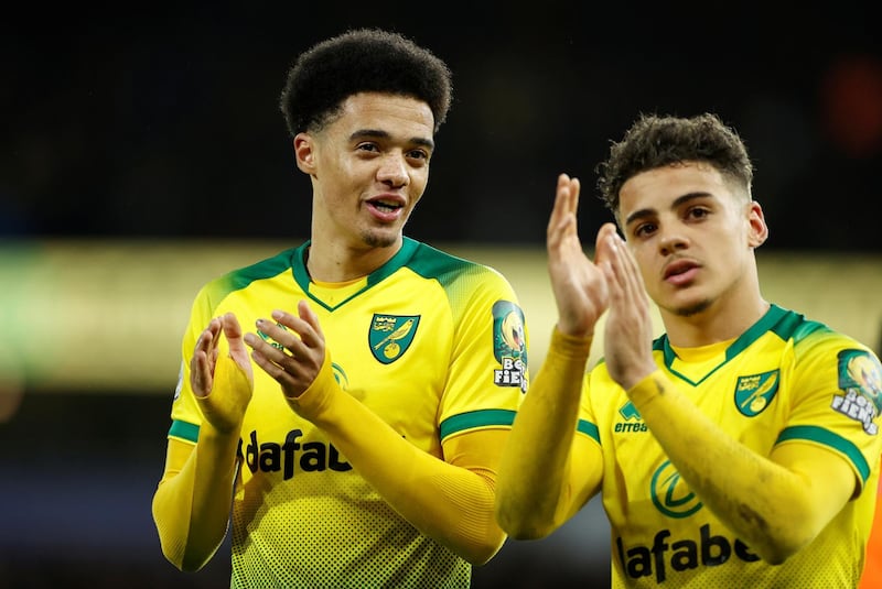 Soccer Football - Premier League - Norwich City v Leicester City - Carrow Road, Norwich, Britain - February 28, 2020   Norwich City's Jamal Lewis and Max Aarons applaud fans after the match   Action Images via Reuters/John Sibley    EDITORIAL USE ONLY. No use with unauthorized audio, video, data, fixture lists, club/league logos or "live" services. Online in-match use limited to 75 images, no video emulation. No use in betting, games or single club/league/player publications.  Please contact your account representative for further details.