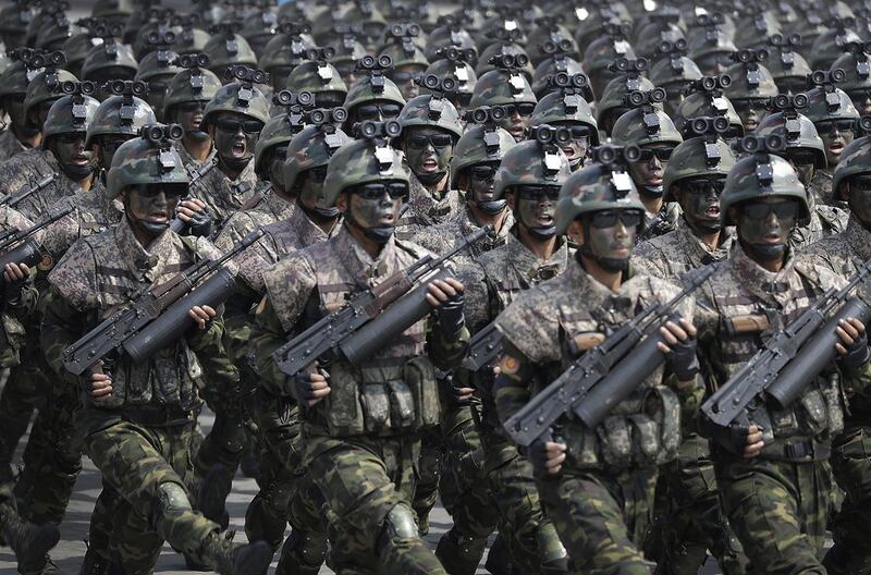 Commandos march across the Kim Il Sung square during a military parade in Pyongyang, North Korea. War with the country could have devastating consequences for investors. Wong Maye-E / AP