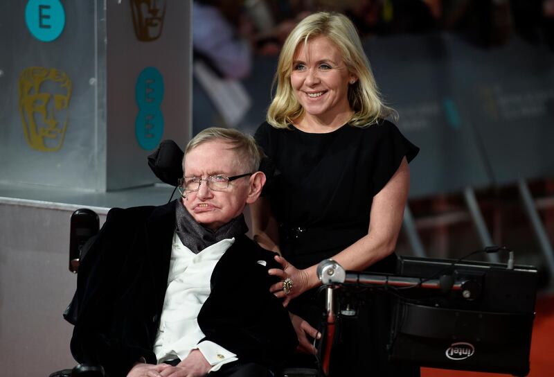 British scientist Stephen Hawking and his daughter Lucy Hawking arrive on the red carpet for the 2015 British Academy Film Awards ceremony at The Royal Opera House in London on February 2015. Facundo Arrizabalaga / EPA