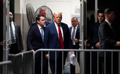 Donald Trump, centre, at the Manhattan criminal court in New York, on April 23. AFP /Bloomberg