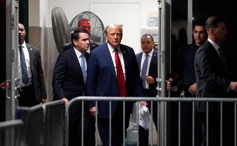 Former US president Donald Trump leaves during a recess at Manhattan Criminal Court in New York. Bloomberg