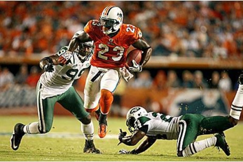 Ronnie Brown, No 23, got the Dolphins what they wanted - a game-winning touchdown.