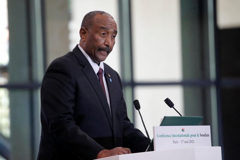 Sudan's President Abdel Fattah Al-Burhan speaks during a session of the international conference on Sudan which aims to provide financing breathing room for its Prime Minister as he pursues economic reforms in Paris on May 17, 2021. - The French government promised to lend $1.5 billion to Sudan to help it pay off its massive foreign debt, kicking off an international summit aimed at helping the aspiring democracy emerge from decades of authoritarian rule. (Photo by Christophe Ena / POOL / AFP)