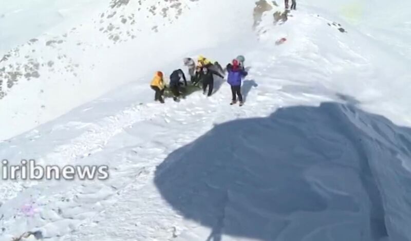 A screen grab from footage broadcast on Iranian state TV Irib shows a rescue operation after eight climbers were found  dead and at least seven others missing due to avalanches north of Tehran. AFP