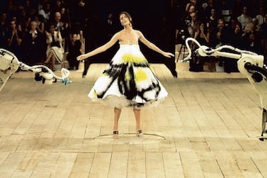 Model Shalom Harlow was sprayed with paint for the spring / summer Alexander McQueen show in 1999, set to the tune of Camille Saint-Saens’s 'The Swan'. Courtesy McQueen