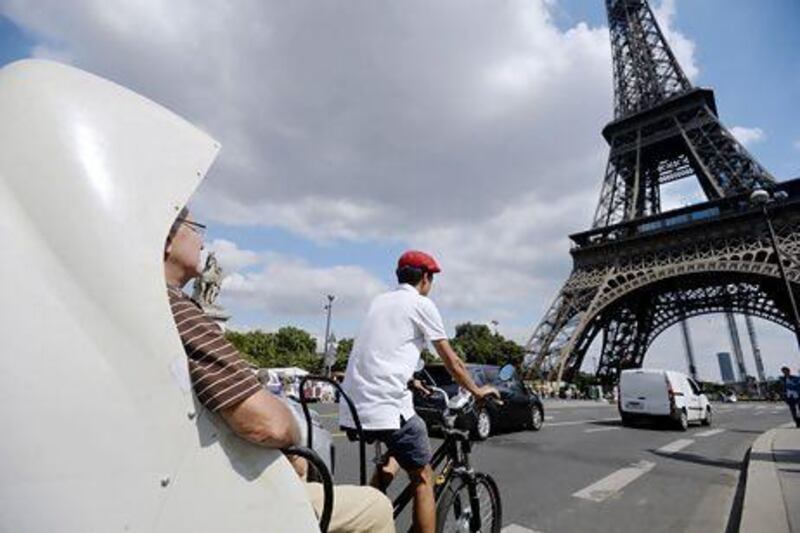 France's tourism and consumer sectors seems to be booming despite the country's overall stagnant economy. Miguel Medina / AFP