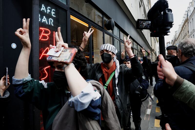 Pro-Palestinian protesters are escorted away by police during the evacuation of the Sciences Po University in Paris. Reuters