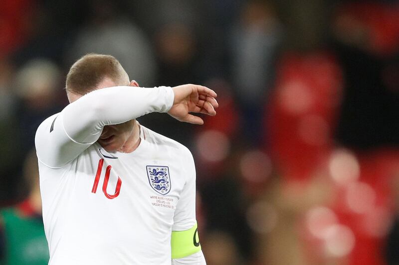 England's Wayne Rooney reacts after the match Action. Reuters