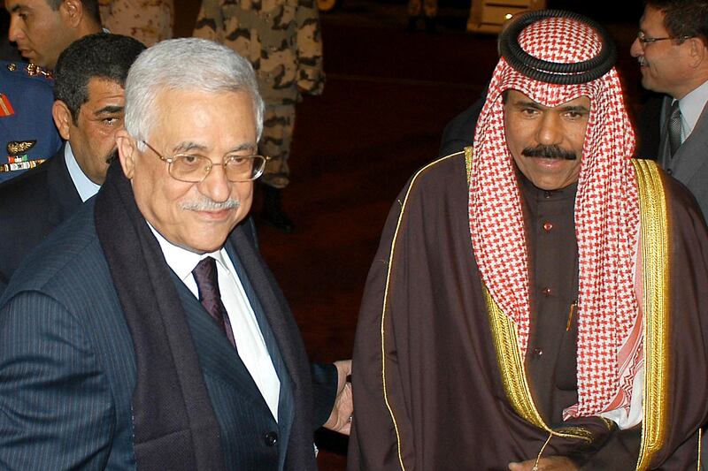 Sheikh Nawaf, Deputy Prime Minister and Interior Minister, receives Palestinian leader Mahmoud Abbas at Kuwait International Airport in February 2006. AFP