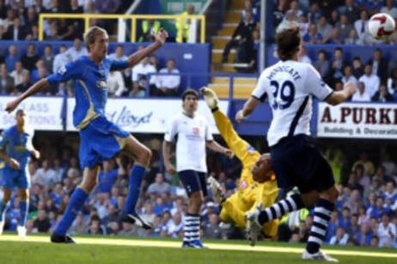 Football - Portsmouth v Tottenham Hotspur Barclays Premier League  - Fratton Park - 28/9/08

Peter Crouch (L) scores Portsmouth's second goal

Mandatory Credit: Action Images / John Sibley

Livepic

NO ONLINE/INTERNET USE WITHOUT A LICENCE FROM THE FOOTBALL DATA CO LTD. FOR LICENCE ENQUIRIES PLEASE TELEPHONE +44 (0) 207 864 9000. *** Local Caption ***  spt_ai_pompey_spurs_19.jpg