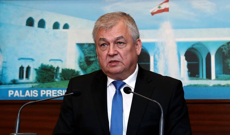 In this photo released by Lebanon's official government photographer Dalati Nohra, Russia's special presidential envoy to Syria Alexander Lavrentiev, speaks to journalist at the presidential palace, in Baabda east of Beirut, Lebanon, Thursday, July 26, 2018. The Russian delegation is in Lebanon to discuss Russian proposals for organizing the return of Syrian refugees from Lebanon and Syria to their homes in Syria. (Dalati Nohra via AP)