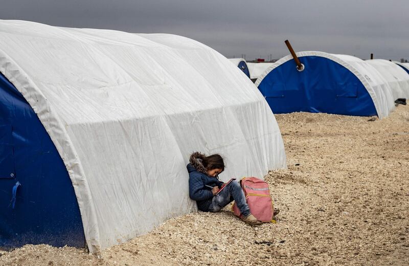 Displaced Syrians are pictured in the Washukanni Camp for the internally displaced people near the predominantly Kurdish city of Hasakeh in northeastern Syria.  AFP