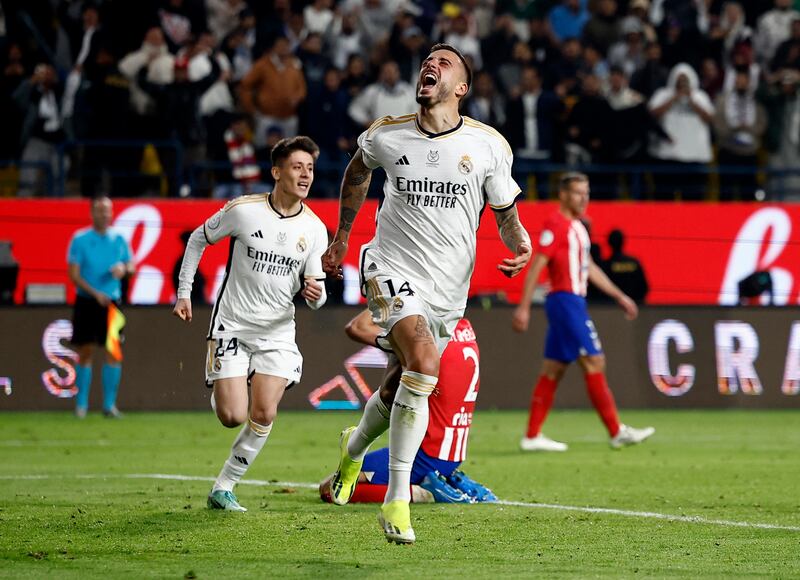 Real Madrid's Joselu celebrates after Atletico Madrid's Stefan Savic scores an own goal. Reuters