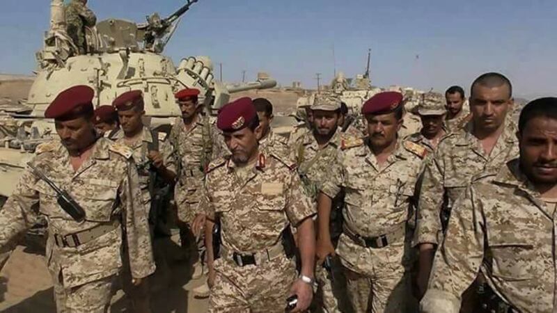 Commander Abdul Rab Al Shaddadi of the Yemen army's Third Military Region, second from left, and Brigadier General Murad Turaiq, second from right, chief of the Yemeni military in Marib and Al Bayda, with their troops in Marib province yesterday. *** Local Caption ***  sp15se-pg3_MAIN.jpg