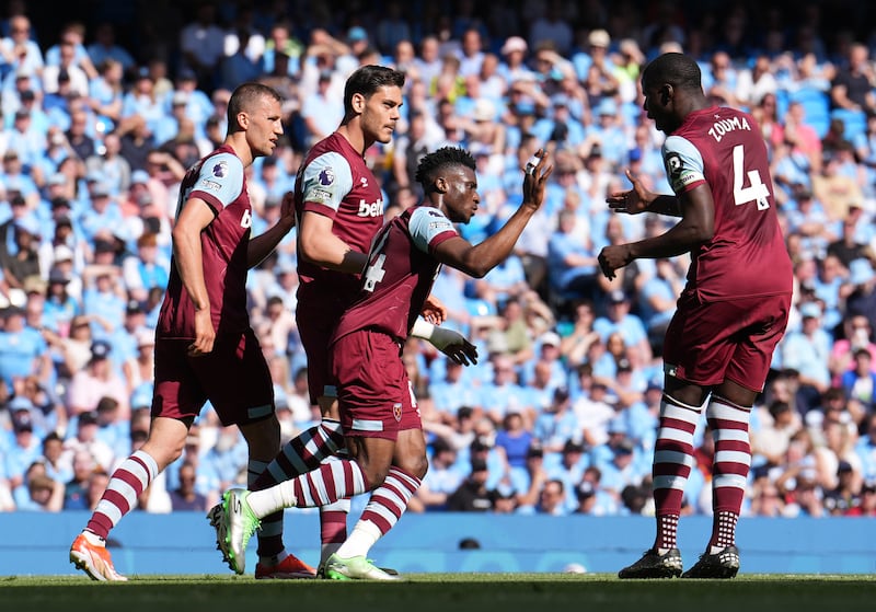 West Ham United's Mohammed Kudus, centre, celebrates scoring their first goal. PA 