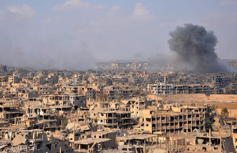 Smoke billows from the eastern Syrian city of Deir Ezzor during an operation by Syrian government forces against Islamic State (IS) group jihadists on November 2, 2017.
Syria's army and allied forces have taken full control of the eastern city of Deir Ezzor from the Islamic State group, Syrian state television said. / AFP PHOTO / STRINGER