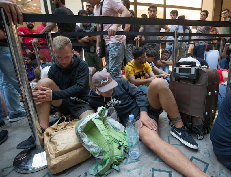 DUBAI, UNITED ARAB EMIRATES, 21 SEPTEMBER 2018 - Crowd at Iphone XS launch at Apple store Dubai Mall.  Leslie Pableo for The National