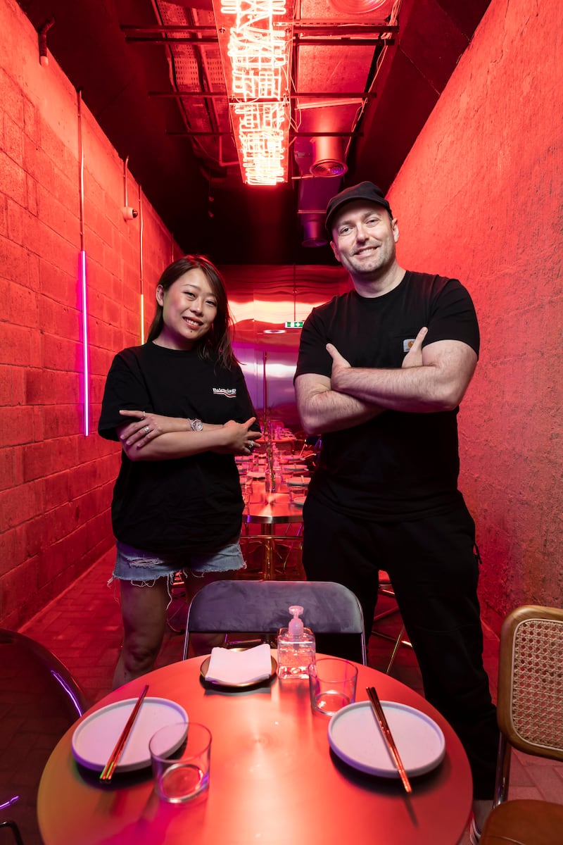 Lynn Lin, left, and Lobito Brigante, owners of the stylish new Asian-inspired restaurant and music space Electric Pawn Shop. Antonie Robertson / The National