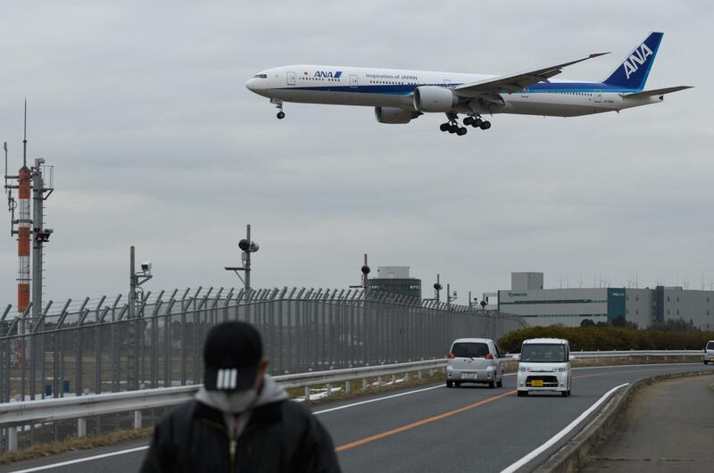 An All Nippon Airways Co. (ANA) aircraft approaches to land at Narita Airport in Narita, Chiba Prefecture, Japan, on Sunday, Jan. 28, 2018. ANA is scheduled to release third-quarter earnings figures on Feb. 1. Photographer: Akio Kon/Bloomberg