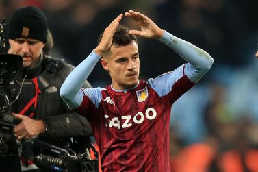 Aston Villa's Brazilian midfielder Philippe Coutinho gestures to supporters after the English Premier League football match between Aston Villa and Manchester Utd at Villa Park in Birmingham, central England on January 15, 2022.  - The game finished 2-2.  (Photo by Lindsey Parnaby / AFP) / RESTRICTED TO EDITORIAL USE.  No use with unauthorized audio, video, data, fixture lists, club/league logos or 'live' services.  Online in-match use limited to 120 images.  An additional 40 images may be used in extra time.  No video emulation.  Social media in-match use limited to 120 images.  An additional 40 images may be used in extra time.  No use in betting publications, games or single club/league/player publications.   /  