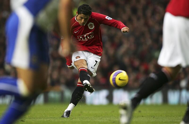 MANCHESTER, UNITED KINGDOM - NOVEMBER 04:  Cristiano Ronaldo of Manchester United  scores his team's second goal during the Barclays Premiership match between Manchester United and Portsmouth at Old Trafford on November 4, 2006 in Manchester, England.  (Photo by Alex Livesey/Getty Images)