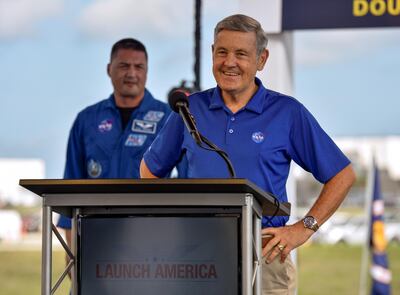 Astronaut Kjell Lindgren listens as KSC director Bob Cabana talks during prelaunch briefing before the launch of the SpaceX Crew Dragon spacecraft on a Falcon 9 booster rocket from Pad39A at the Kennedy Space Center in Cape Canaveral, Florida, U.S., May 29, 2020.  REUTERS/Steve Nesius