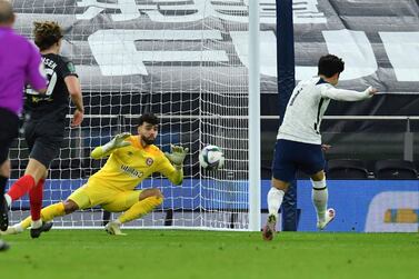 Tottenham's Son Heung-min scores his side's second goa during the EFL Cup semi-final soccer match between Tottenham Hotspur and Brentford. AP