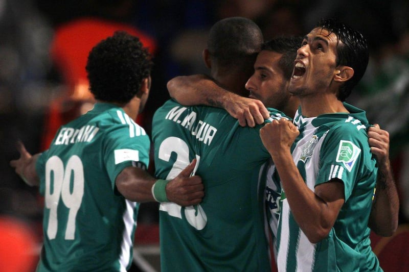 Raja Casablanca celebrate after Mouhssine Iajour's goal during their win over Atletico Mineiro on Wednesday night. Amr Abdallah Dalsh / Reuters