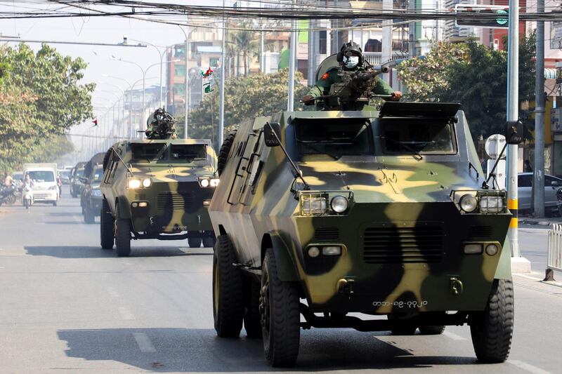Armoured personnel carriers are seen on the streets of Mandalay on February 3, 2021, as calls for a civil disobedience gather pace following a military coup which saw civilian leader Aung San Suu Kyi being detained. / AFP / STR
