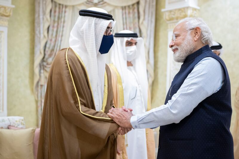 Sheikh Abdullah bin Zayed, Minister of Foreign Affairs and International Co-operation, greets Mr Modi at the airport.
