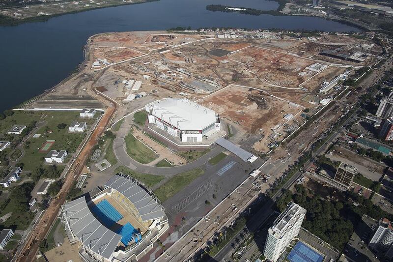 This aerial view shows Olympic Park and the nearby Athletes Village in Rio de Janeiro under construction in the area that previously occupied by the Jacarepagua Autodrome. Brazil now begins the task of preparing Rio's 2016 Olympic venues, an an even larger challenge than the 2014 Fifa World Cup tournament the country just hosted. Leo Correa / AP Photo