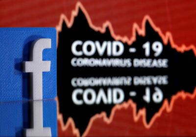 FILE PHOTO: A 3D printed Facebook logo is seen in front of displayed coronavirus disease (COVID-19) words in this illustration taken March 24, 2020. Picture taken March 24, 2020. REUTERS/Dado Ruvic/Illustration/File Photo