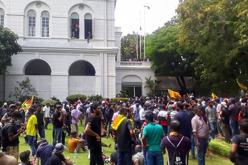 Protesters gather inside the compound of Sri Lanka's Presidential Palace in Colombo. AFP