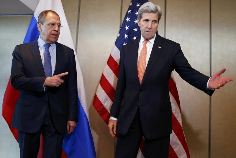 US secretary of state John Kerry (R) and Russian foreign minister Sergei Lavrov are pictured together before holding bilateral talks ahead of the 17-nation International Syria Support Group meeting in Munich. Michael Dalder/Reuters