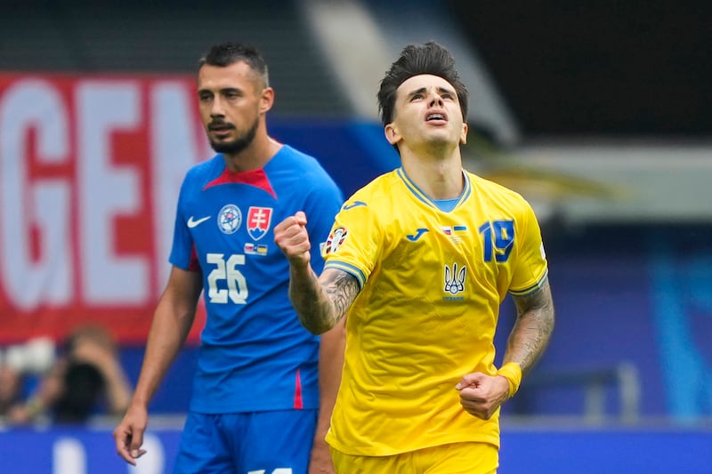 Mykola Shaparenko played a role in both the goals for Ukraine. AP