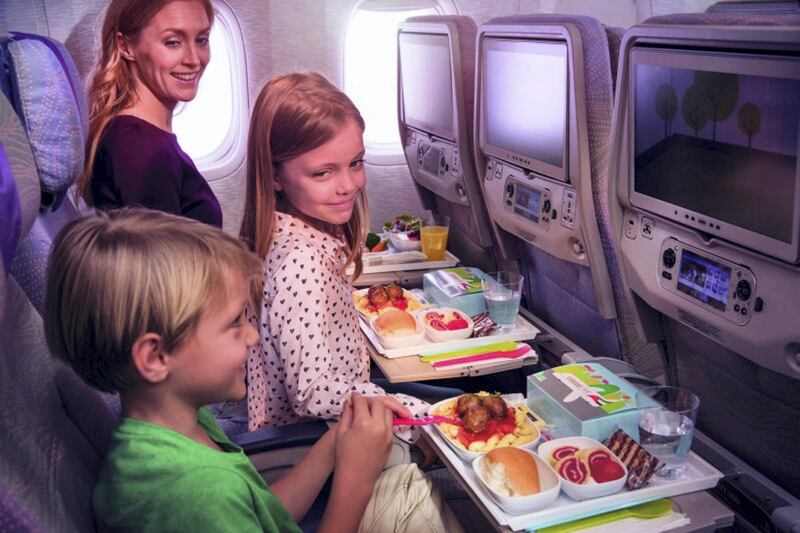 Keeping kids entertained on a flight can be a challenge for any parent. Courtesy Emirates