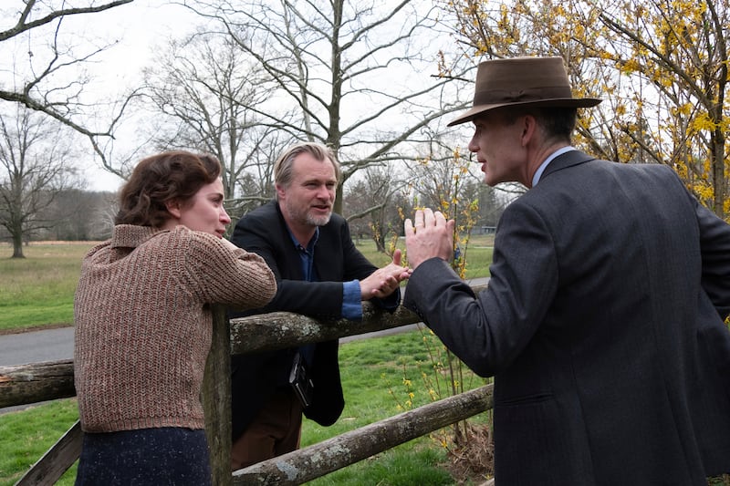 Director Christopher Nolan with actors Emily Blunt and Cillian Murphy on the set of Oppenheimer. AP