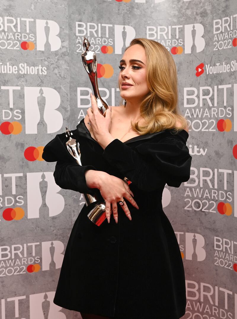 Adele, wearing a Marianna Senchina velvet mini jacket dress. Getty Images