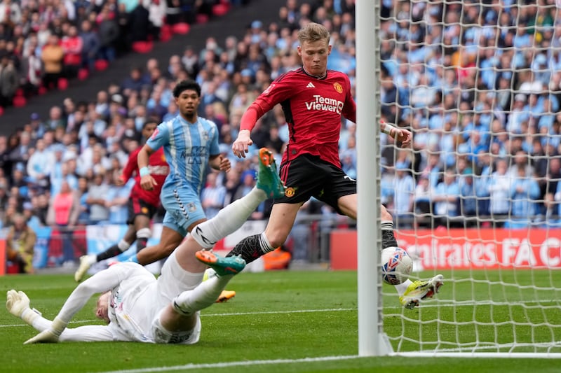 Manchester United's Scott McTominay scores the opening goal. AP